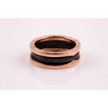 Bulgari. An 18ct rose gold and ceramic B zero1 ring, marked 750, and numbered. Size 64; 9.54