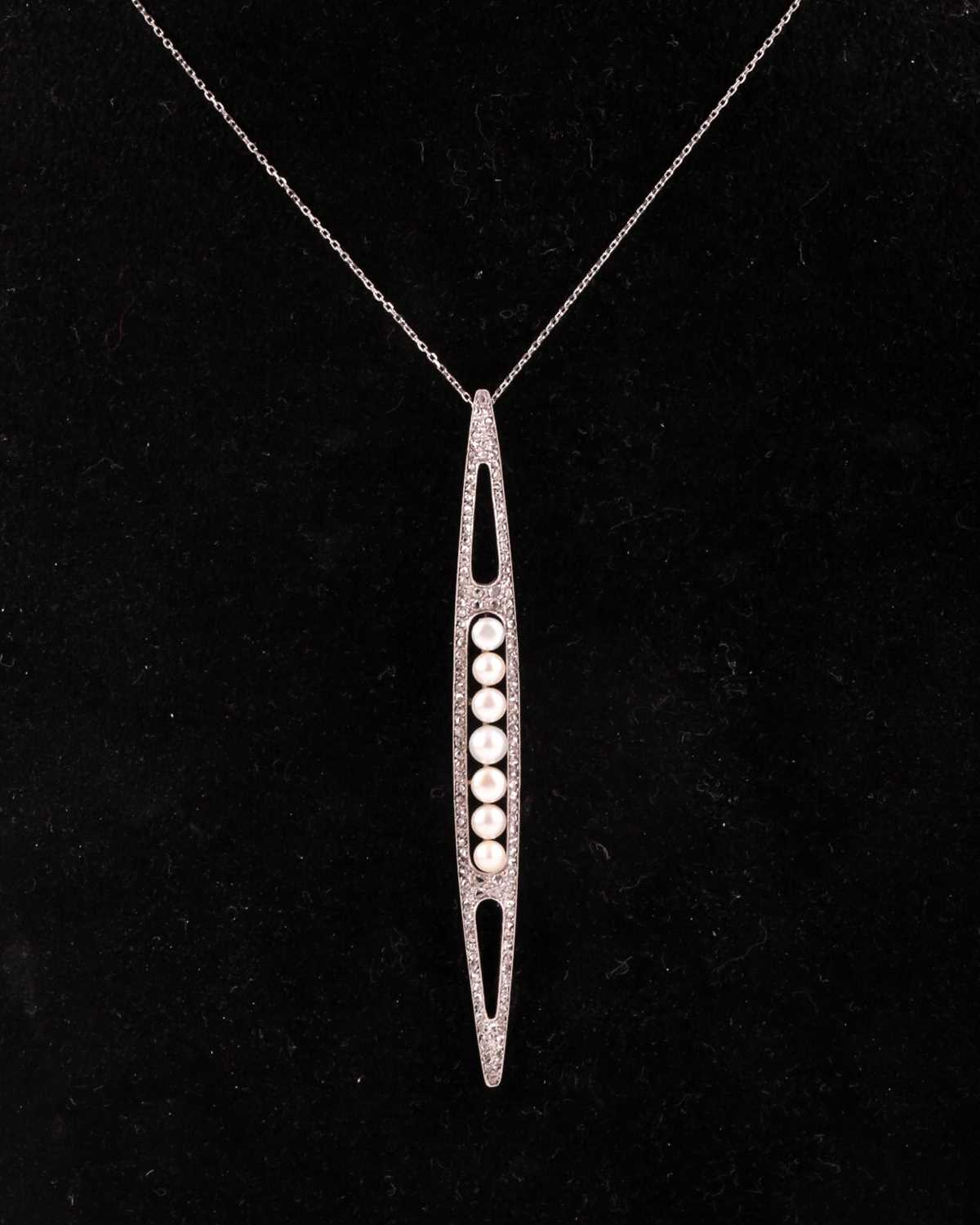 An unusual converted Edwardian diamond and pearl pendant, the elongated openwork mount centred - Image 5 of 6