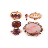 A group of five various 19th-century brooches, including amethyst, agate and paste in gilt and