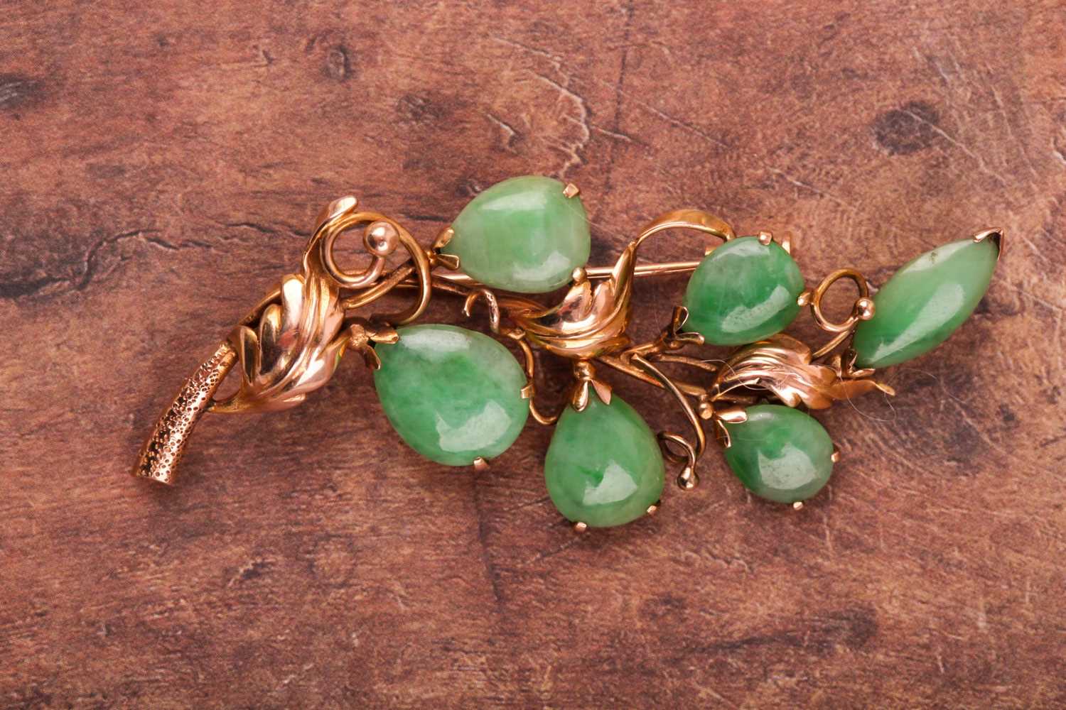 A 14ct yellow gold and jadeite brooch, of foliate design, stamped 14K.Condition report: 6.8g - Image 2 of 3