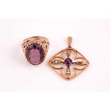 An Edwardian amethyst and split pearl pendant, the cruciform centre with collet set amethyst