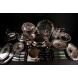 A collection of assorted silver plated wares, to include a pair of vegetable tureens and covers, a