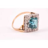 An 18ct yellow gold, diamond, and blue zircon ring, set with a mixed square-cut zircon of