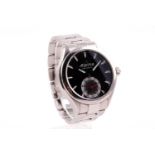 An Alpina stainless steel gentleman's wristwatch, the black dial with luminous numerals and