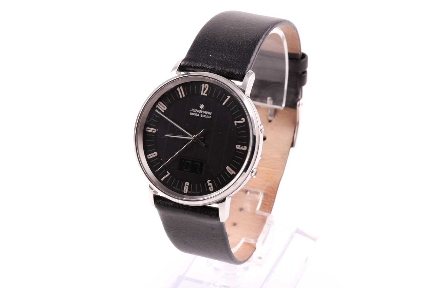 A Junghans Mega Solar radio controlled wristwatch, the black dial with small silvered numerals,