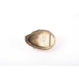 A Victorian Cowrie shell and brass snuff box monogrammed CW. Containing a handwritten letter