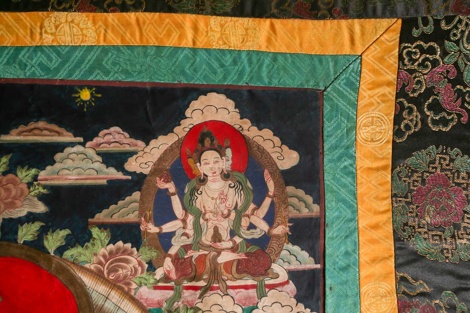 A Tibetan thangka painted on fabric depicting the seated white Tara with her hands in the varada - Image 6 of 8
