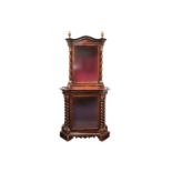 A 19th century Italian rosewood and walnut two-section display cabinet with Solomonic columns with