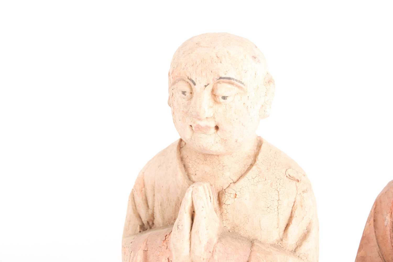 A pair of Chinese carved and earth pigment painted wooden figures of Buddhist monks one with hands - Image 2 of 7