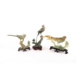 Three Chinese carved hardstone models of long tailed birds, Peoples Republic period, each carved