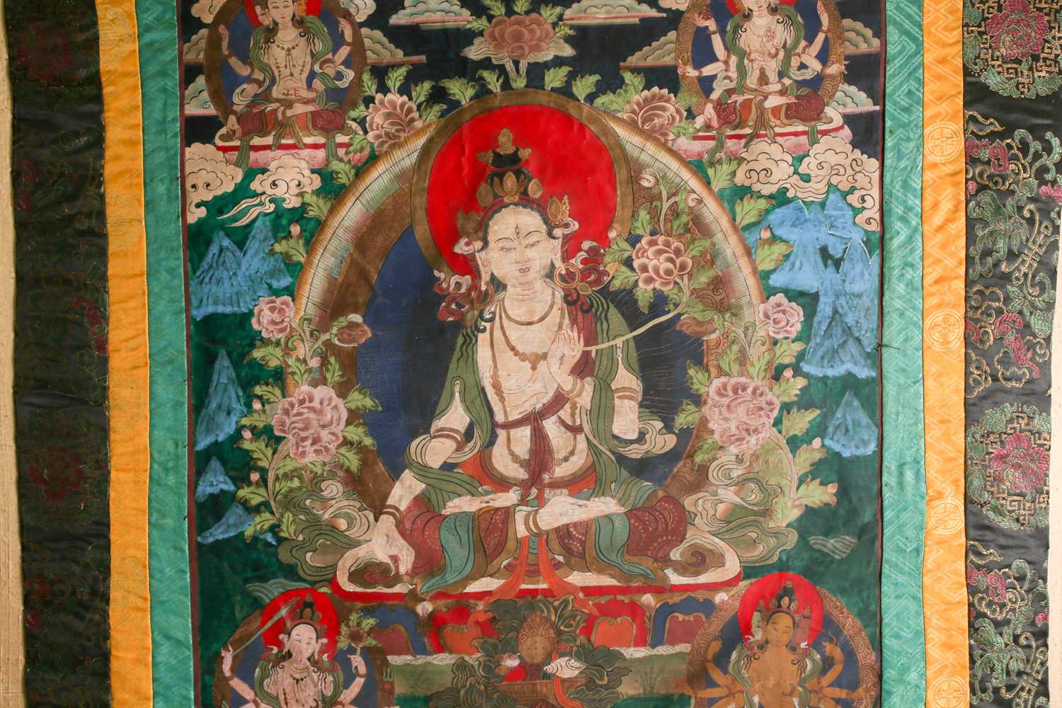 A Tibetan thangka painted on fabric depicting the seated white Tara with her hands in the varada - Image 7 of 8