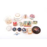 Nine Halcyon Days enamel trinket boxes and a spill vase, a Crown Staffordshire RAF ensign, a