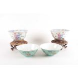 A pair of Chinese thinly potted porcelain bowls, Republic or slightly later, the exterior painted