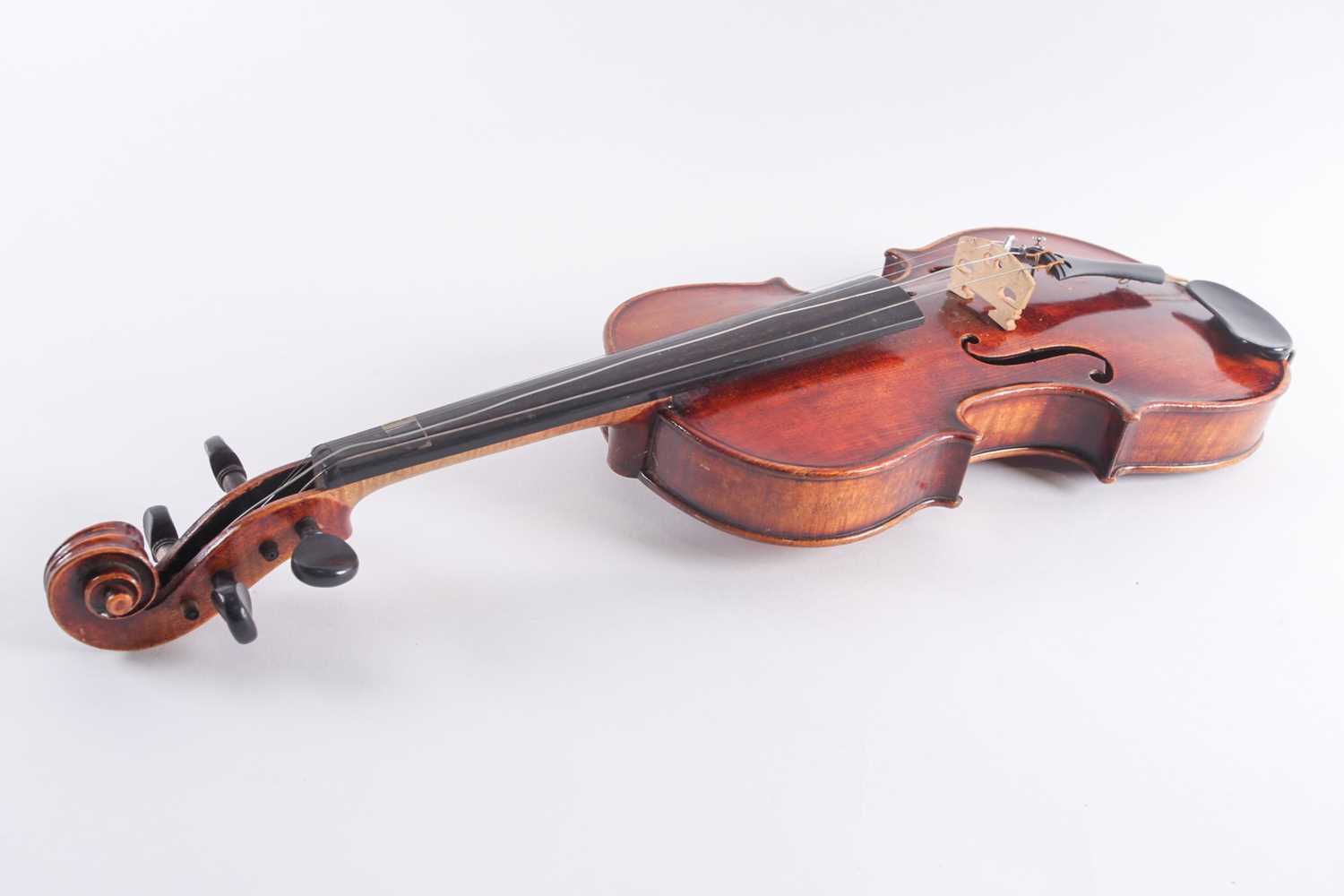 A German three-quarter violin with scarfed scroll and two-piece figured back. Bearing a "Caspar Da - Image 9 of 11