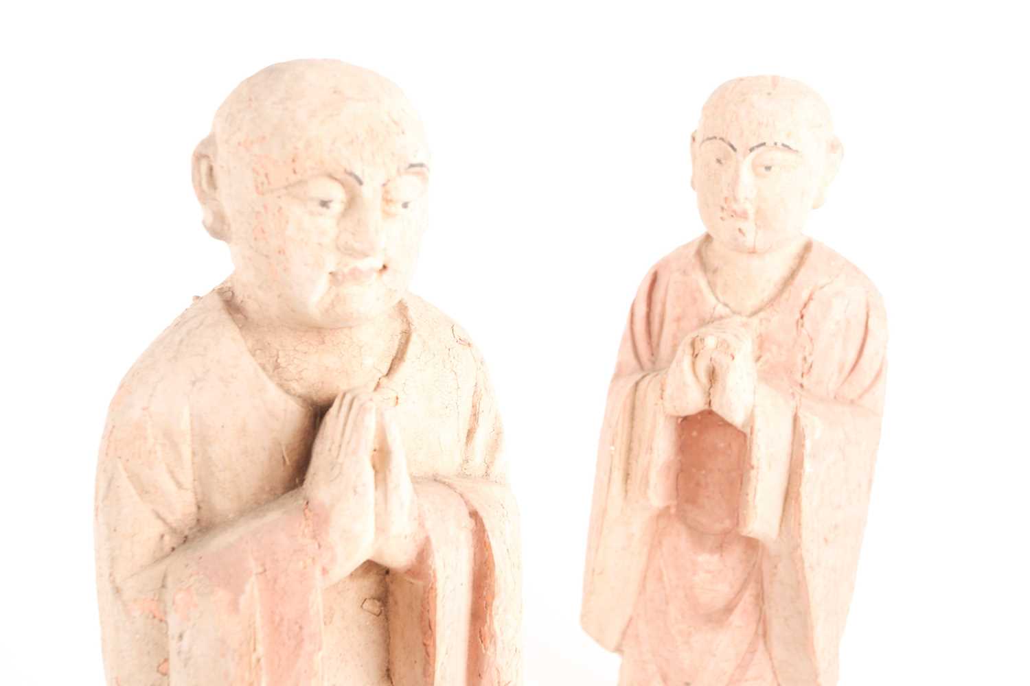 A pair of Chinese carved and earth pigment painted wooden figures of Buddhist monks one with hands - Image 6 of 7
