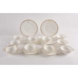 A quantity of Mintons porcelain to include four twin-handled soup bowls with accompanying saucers,