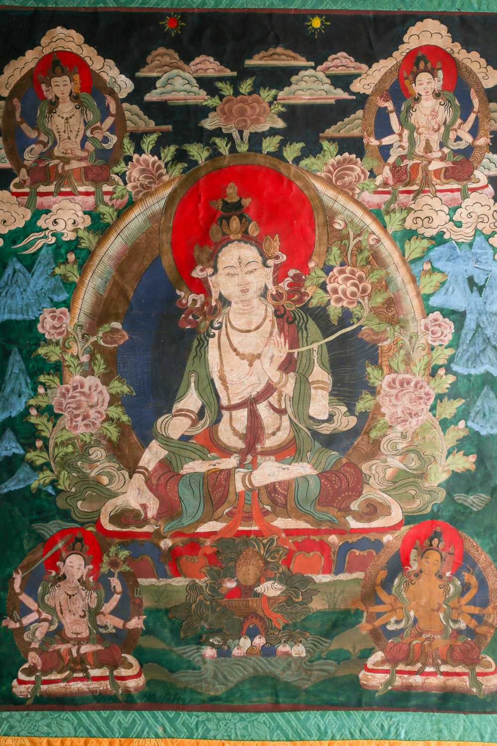 A Tibetan thangka painted on fabric depicting the seated white Tara with her hands in the varada - Image 2 of 8