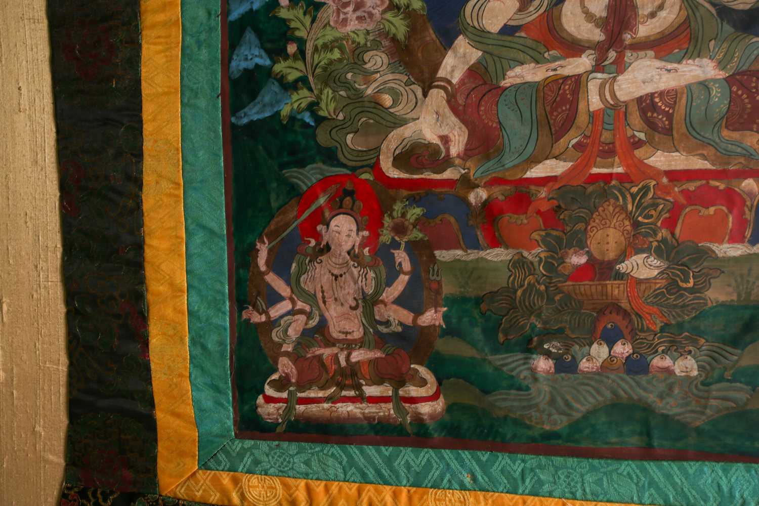 A Tibetan thangka painted on fabric depicting the seated white Tara with her hands in the varada - Image 4 of 8