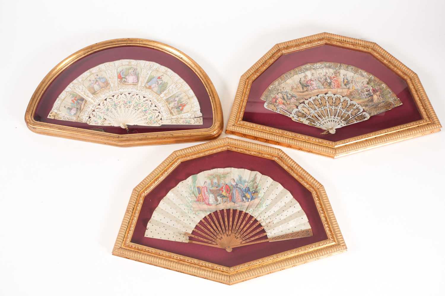 A late 18th century engraved, pierced, and gilt mother of pearl fan, the printed paper leaf with