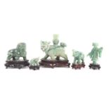 A group of five Chinese hardstone carvings, Peoples Republic period, comprising a Bixie candlestick,