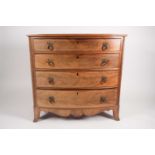 A Regency Scottish mahogany bow fronted chest of four long and graduated drawers, each with