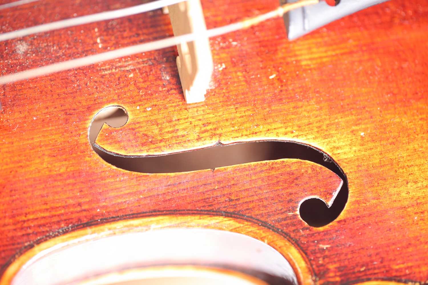 A German three-quarter violin with scarfed scroll and two-piece figured back. Bearing a "Caspar Da - Image 4 of 11