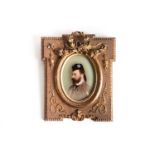 A 19th century reverse-painted oval portrait on glass of Edward VII as the Prince of Wales, 13.5