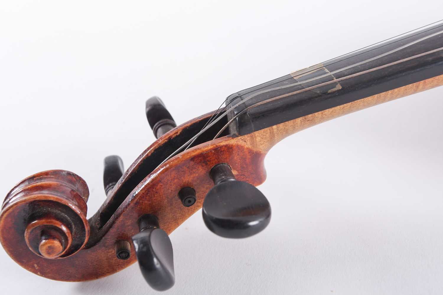 A German three-quarter violin with scarfed scroll and two-piece figured back. Bearing a "Caspar Da - Image 8 of 11