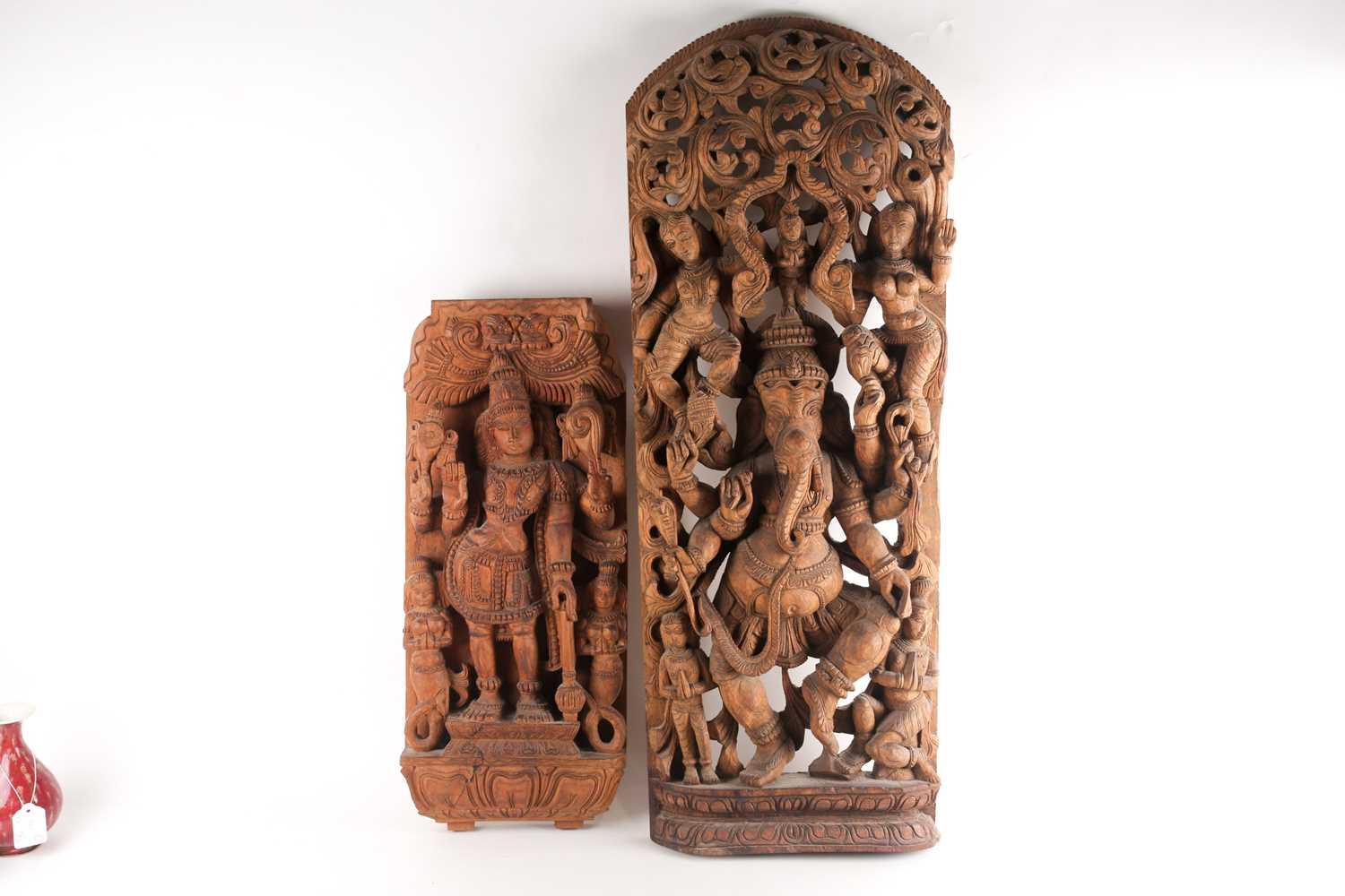 An Indian teak wood arched architectural panel, carved and pierced with Lord Ganesh and attendants - Image 6 of 8