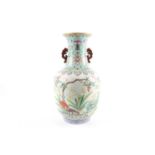 A Chinese Famille rose porcelain baluster vase with a pair of pierced fungus handles, Republic