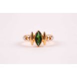 An 18ct yellow gold and green gemstone ring, set with a marquise-shaped stone, possibly diopside,