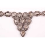 An Indian silver gilt and diamond pendant necklace, the pear-shaped clusters each centred with