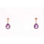 A pair of diamond and amethyst drop earrings, each with a pear-shaped chequerboard-faceted