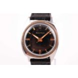 A Bulova Accutron stainless steel electronic wristwatch, the black dial with gilt indices, and