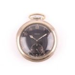 A WWII era Zenith German military pocket watch, the black dial with Arabic numerals, and