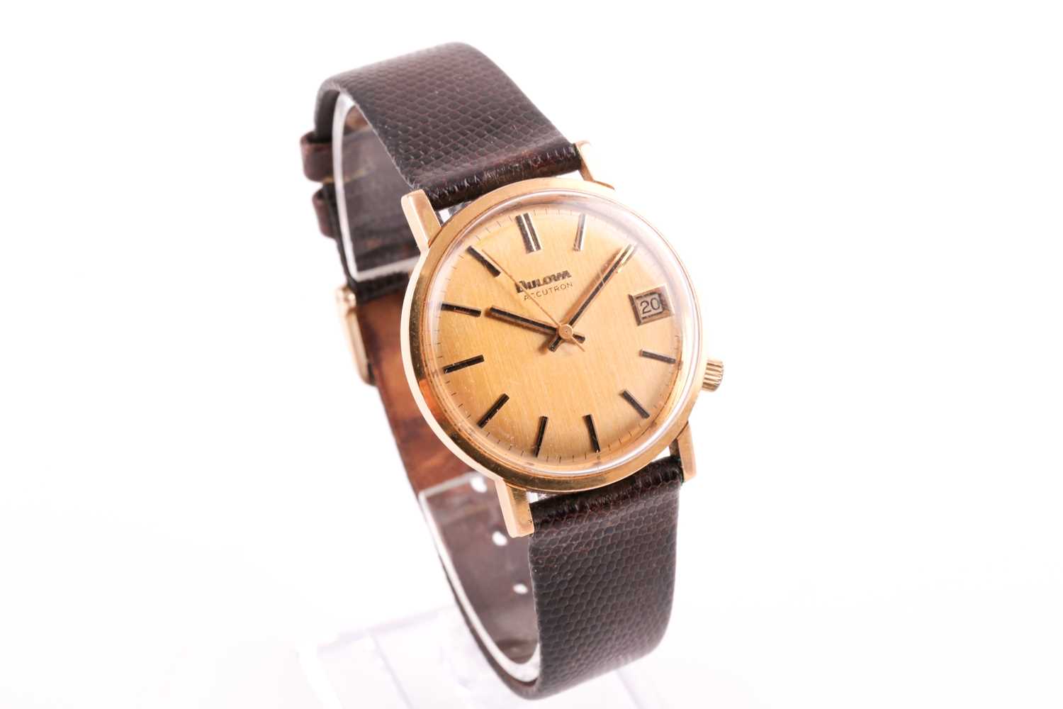 A Bulova Accutron 9ct yellow gold electronic wristwatch, with gilt dial, black baton indices and - Image 7 of 10