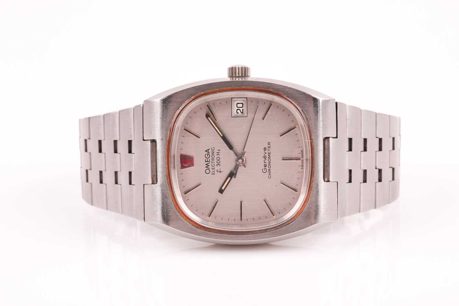 An Omega f300Hz electronic wristwatch, the rounded square silvered dial with baton indices, and date