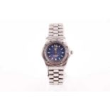 Tag Heuer. A lady's Professional 200m WK1313 quartz wristwatch, the blue dial with luminous baton
