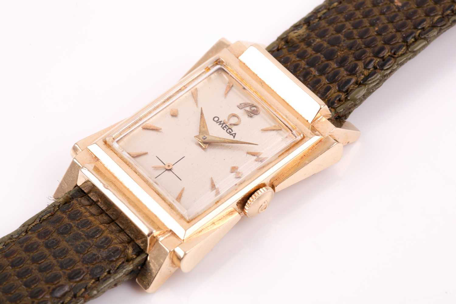 Omega. A rectangular gold cased 1940's wristwatch, the signed silvered dial with applied gilt dart - Image 6 of 6