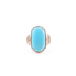A 9ct yellow gold, diamond, and turquoise ring, set with a cabochon rectangular-shaped Arizona