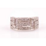 An 18ct white gold and diamond set ring, in a Greek key design, inset with small round-cut diamonds,