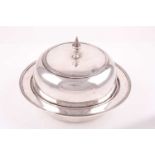 A silver muffin dish and cover, Sheffield 1919 by the Goldsmiths and Silversmiths Company;