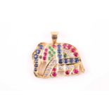 A 14ct yellow gold, sapphire, ruby, and emerald set pendant in the form of an elephant, set with