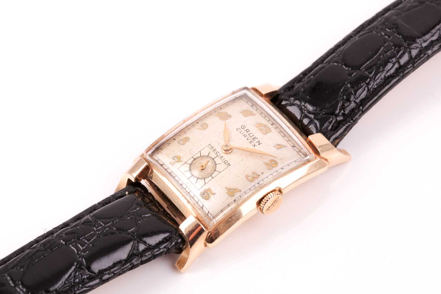 Gruen. A gentleman's gold curvex wristwatch, the champagne dial with Arabic numerals and - Image 2 of 5