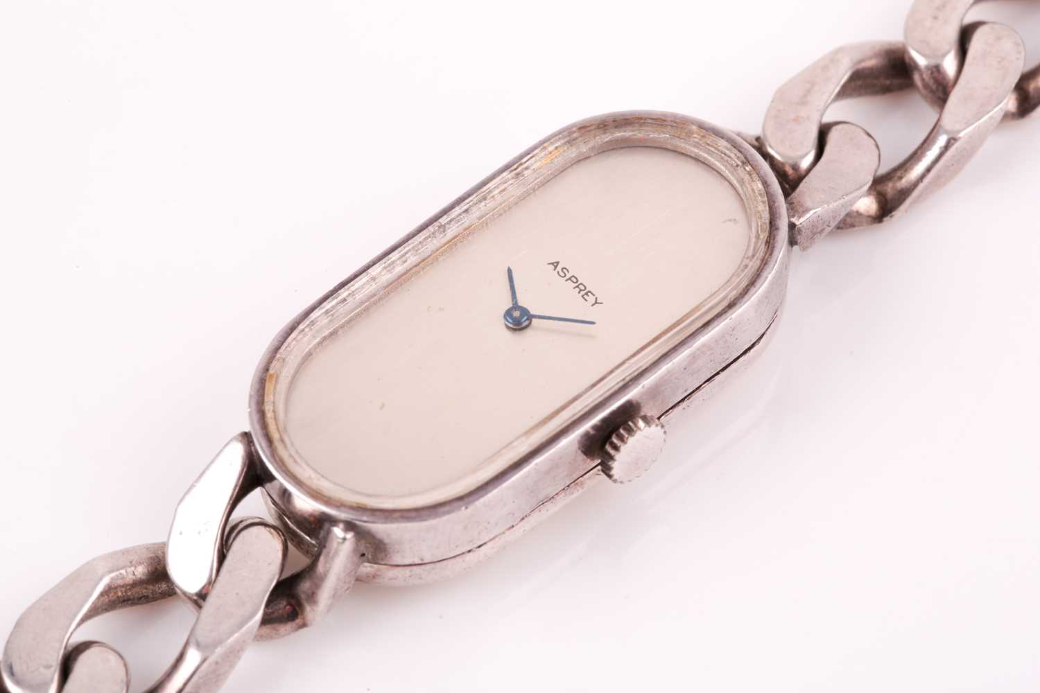 Asprey. A lady's silver wristwatch, the elongated oval brushed silvered dial with simple arrowhead - Image 18 of 18