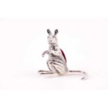 A white metal pin cushion in the form of a kangaroo, 4 cm high, stamped "Sterling" and "925".