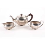 A mid 20th century Sheffield silver three-piece silver tea set Sheffield 1957 by James Deakin.