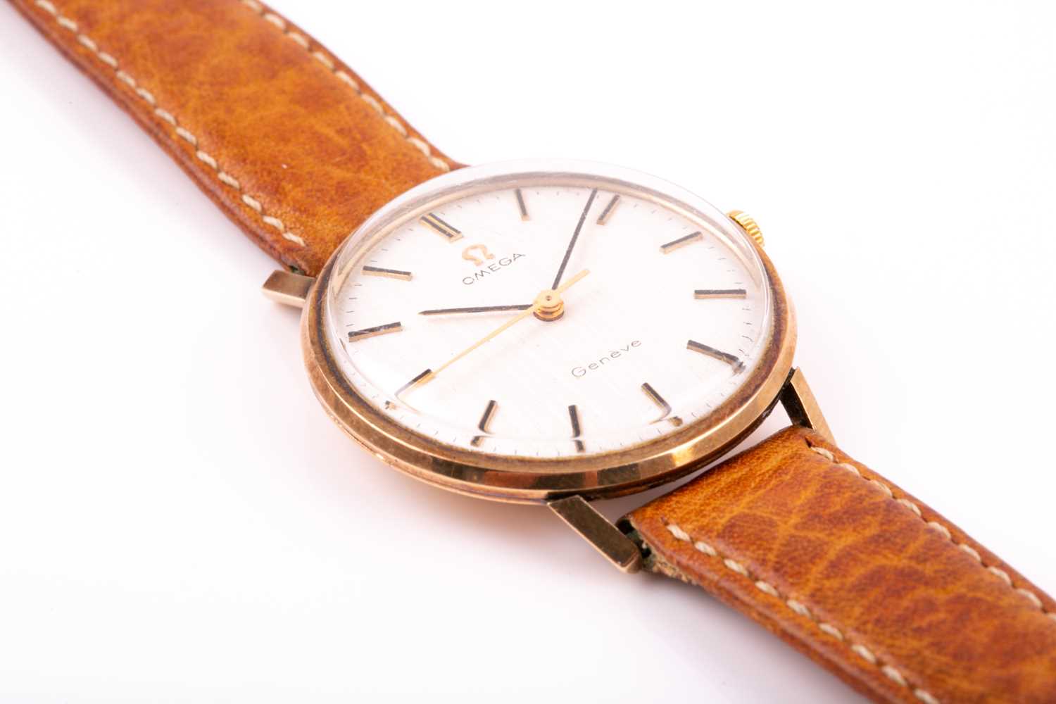 Omega. A gentleman's 9ct gold Geneve wristwatch, the brushed circular dial with baton indices and - Image 8 of 8