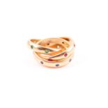 An unusual 18ct yellow gold Russian-style ring, the three interlocking bands inset with small