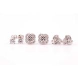 A pair of 9ct white gold and solitaire CZ stud earrings, together with a pair of silver and